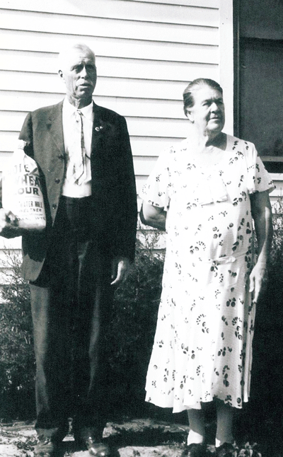 James McGee and Mary with sack of flour